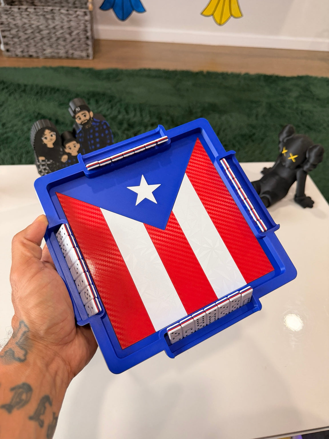 Handheld Puerto Rico mini domino set showing compact size