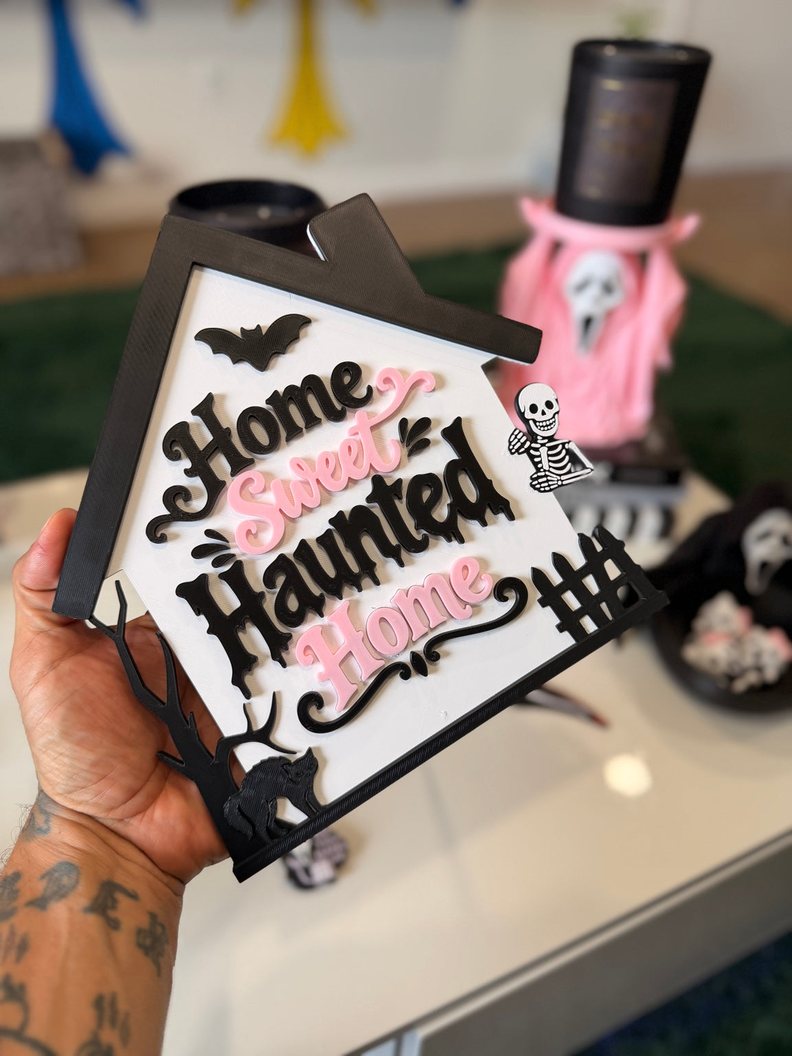 Home Sweet Haunted Home sign stand front view