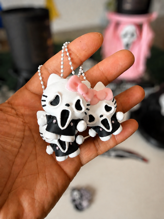 GhostFace kitty keychain group with softly blurred background