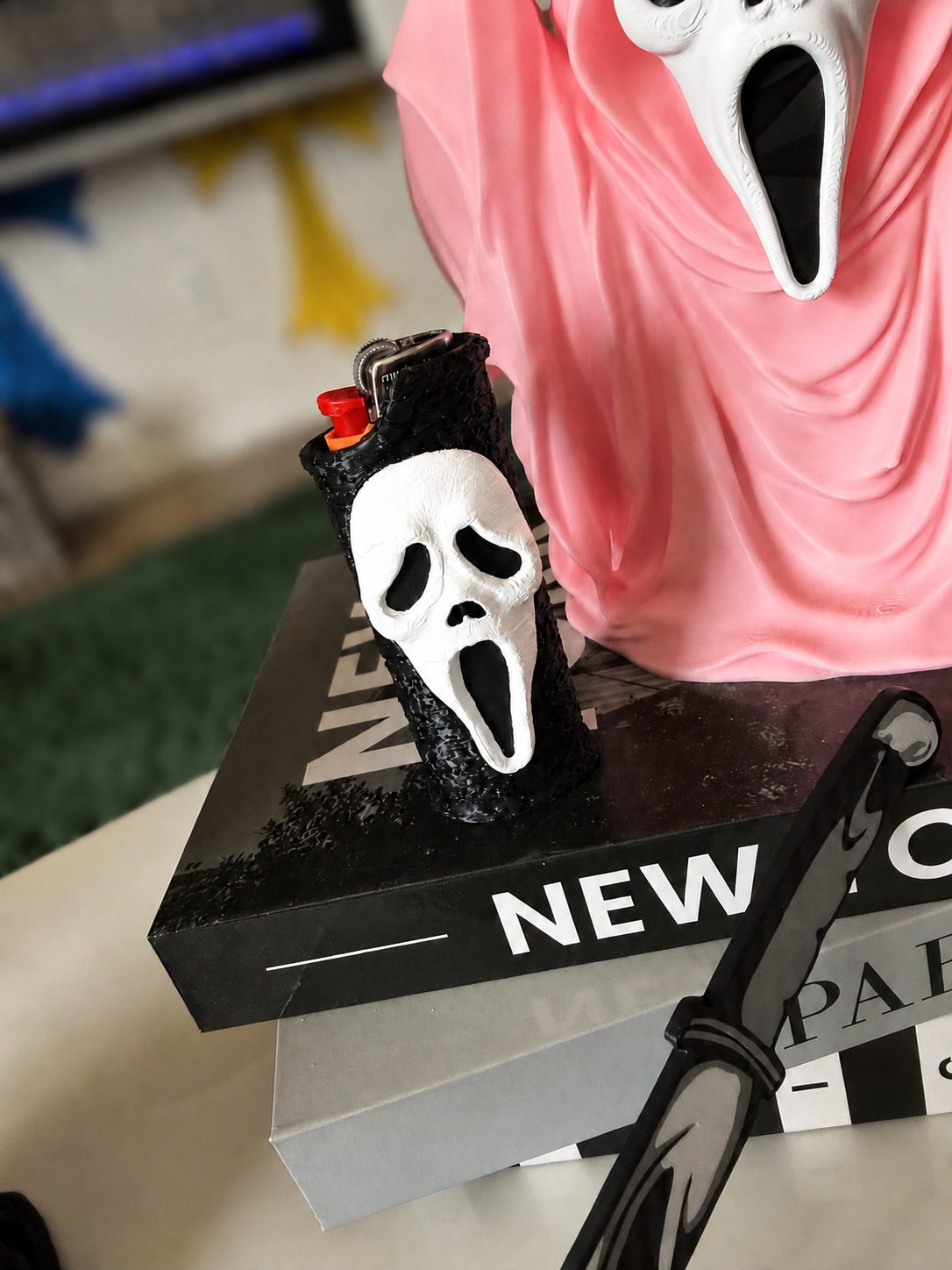 GhostFace lighter sleeve with bright white mask and softly blurred background